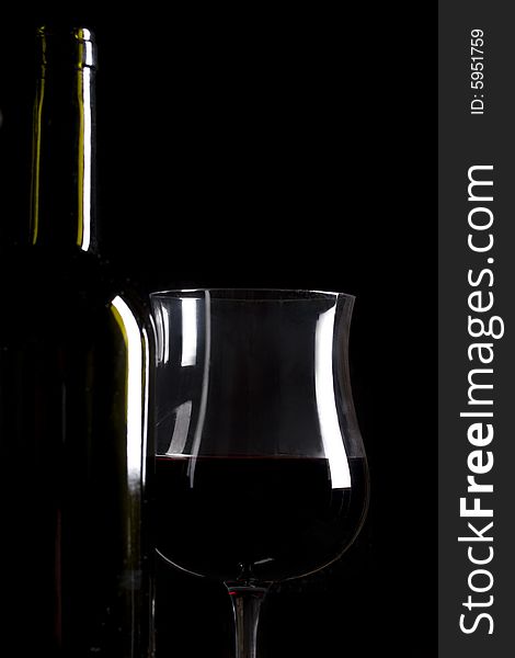 Wine glass silhouette on black background
