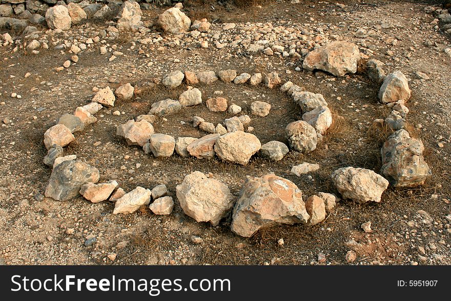 Stone curl on dry earth