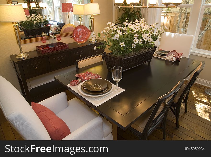 Dining room and table with modern decor. Dining room and table with modern decor.