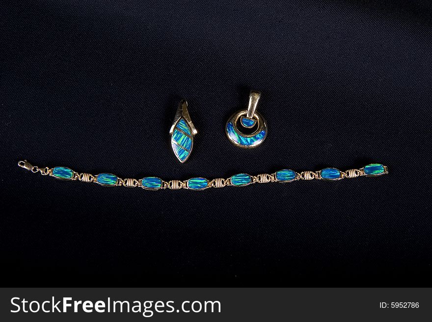 Beautiful turquoise jewelry on black background. Beautiful turquoise jewelry on black background