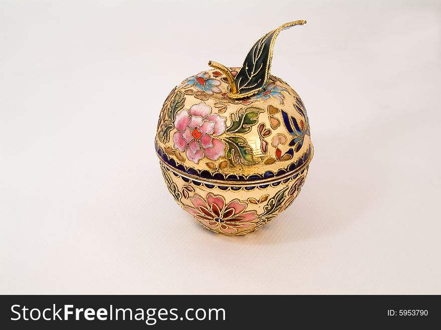 This is the colse-up of a small art pot. It is made in Chinese traditional cloisonne technical. This is the colse-up of a small art pot. It is made in Chinese traditional cloisonne technical.