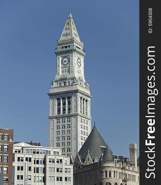 Historic Old Stone Church clocktower against blue sky. Historic Old Stone Church clocktower against blue sky