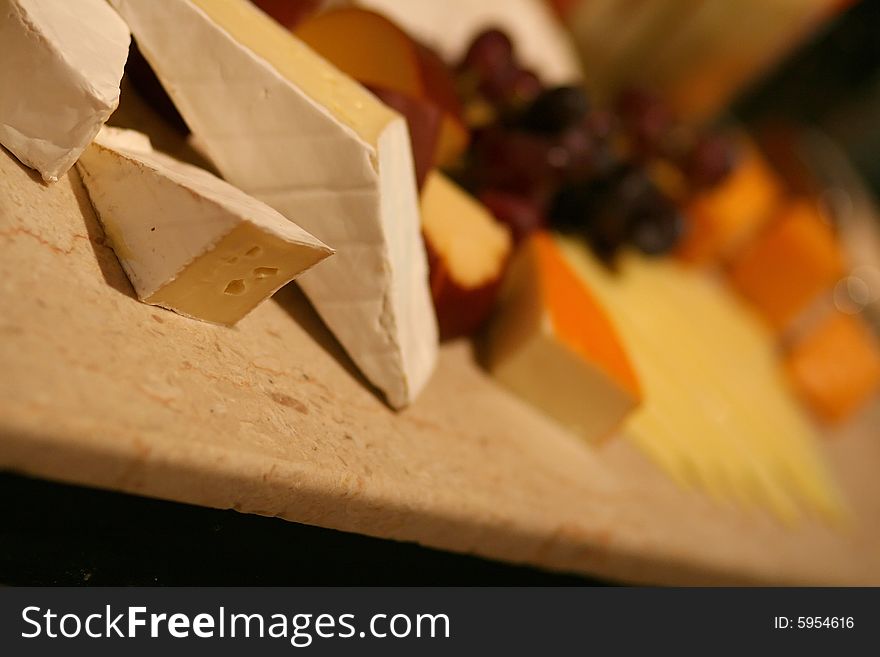 Selection of gourmet cheeses arranged beautifully. Selection of gourmet cheeses arranged beautifully