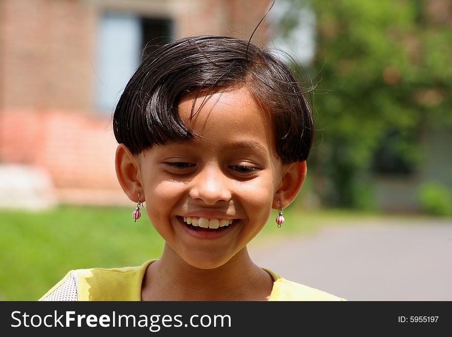 A girl laughing suddenly on something. A girl laughing suddenly on something.