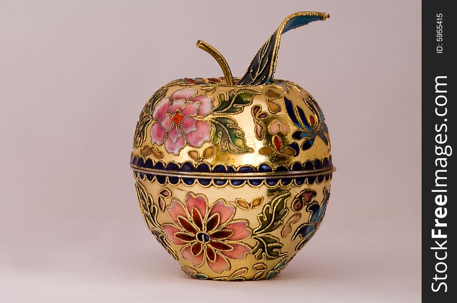 This is the colse-up of a small art pot. It is made in Chinese traditional cloisonne technical. This is the colse-up of a small art pot. It is made in Chinese traditional cloisonne technical.