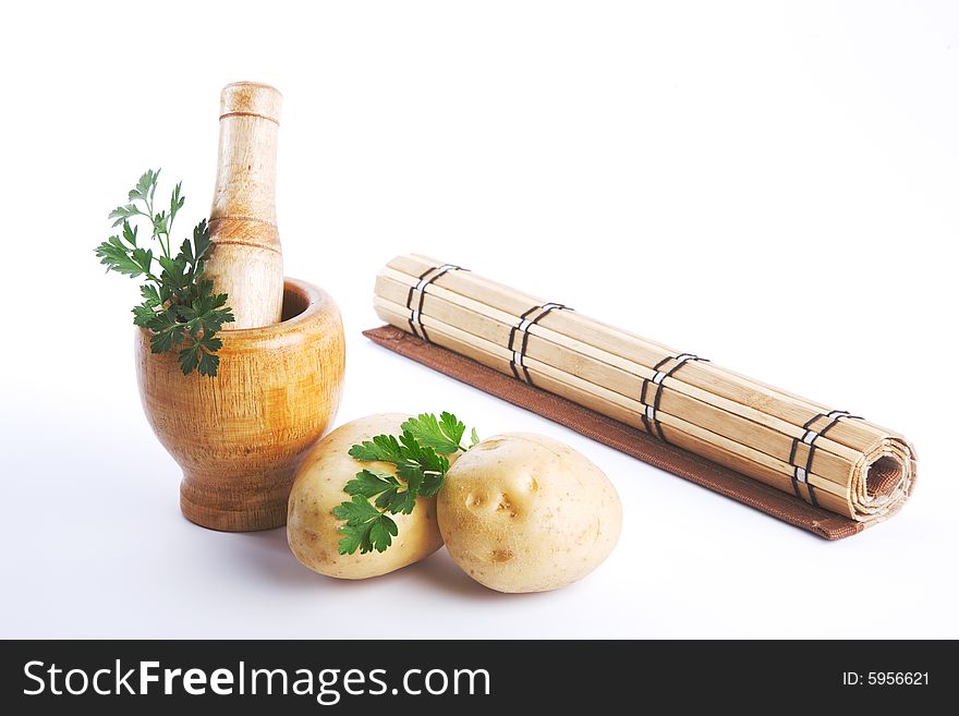 Mortar and pestle, kitchen scene shot in studio, isolated on white background. Mortar and pestle, kitchen scene shot in studio, isolated on white background