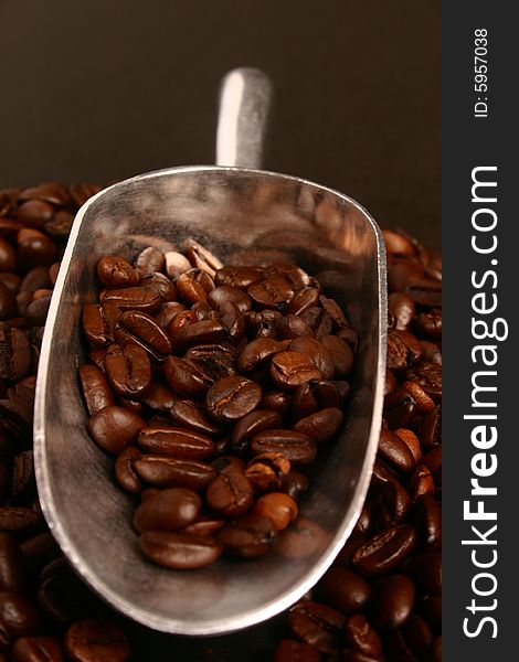 Coffee beans and scoop