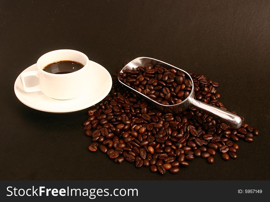 Coffee,coffee Beans And Scoop