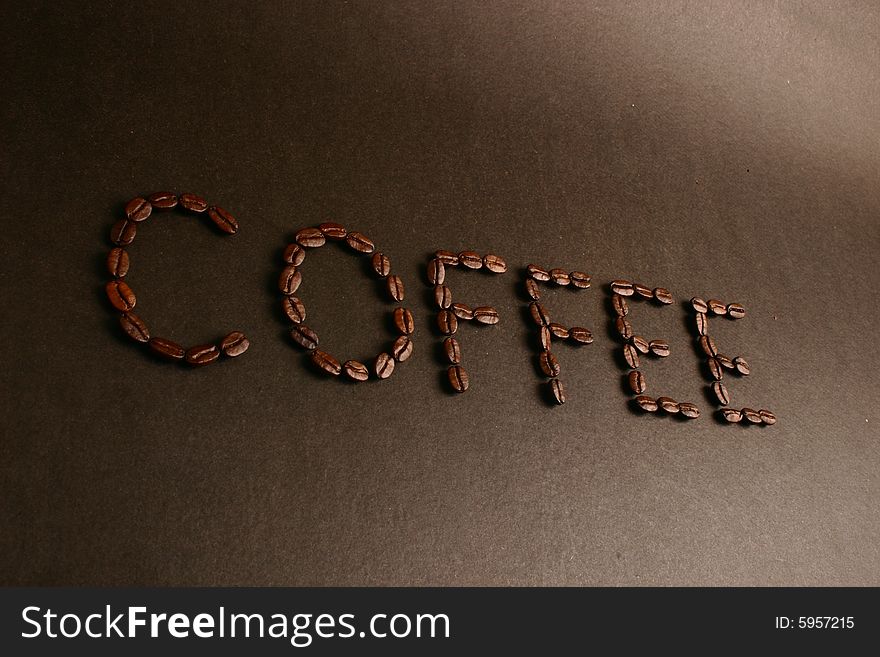 A word coffee from a coffee beans