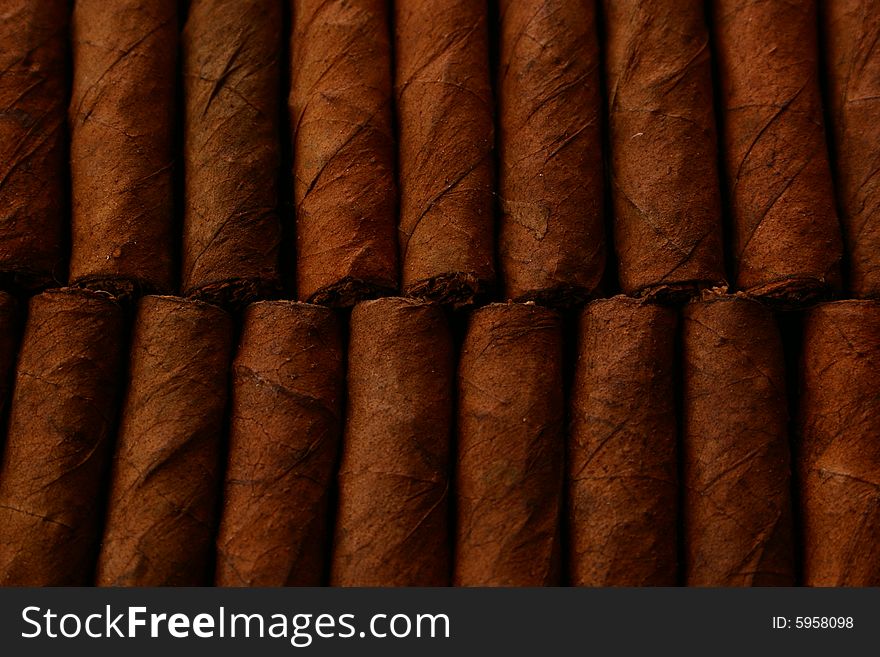 Pattern of cigars arranged next to each others