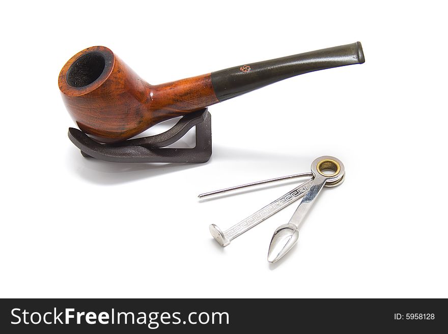 Old tobacco pipe - smoke is danger