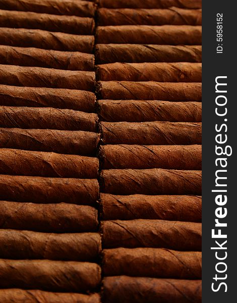 Pattern of cigars arranged next to each others