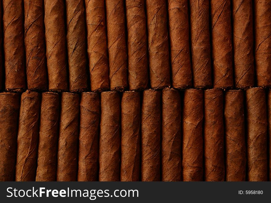 Pattern of cigars arranged next to each others