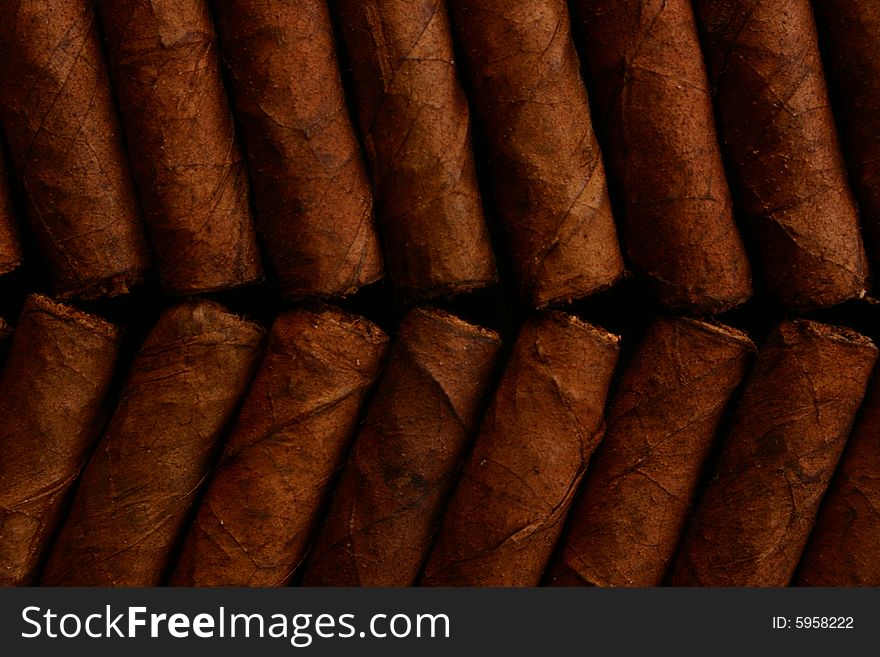 Pattern of cigars arranged next to each others