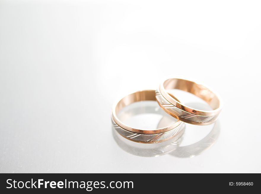 Two wedding rings - white and yellow gold. Two wedding rings - white and yellow gold