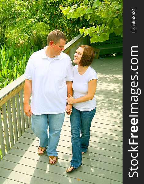 Couple doing evening walk and talking. concept for happiness, love or family. Couple doing evening walk and talking. concept for happiness, love or family