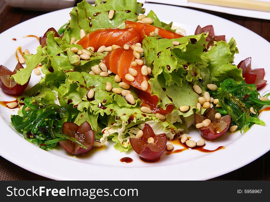 Salad with salmon and algae. Salad with salmon and algae.
