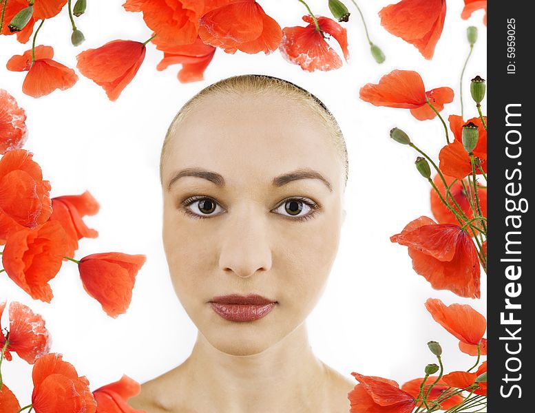 beautiful and sensual woman with poppy flowers against the white background. beautiful and sensual woman with poppy flowers against the white background