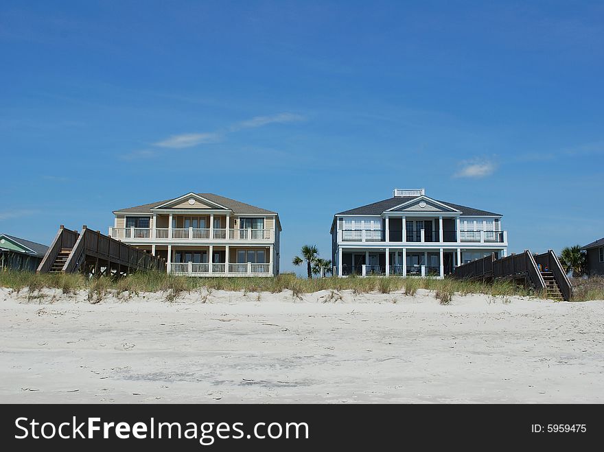 A pair of beach houses stand watch on Myrtle Beach. A pair of beach houses stand watch on Myrtle Beach.