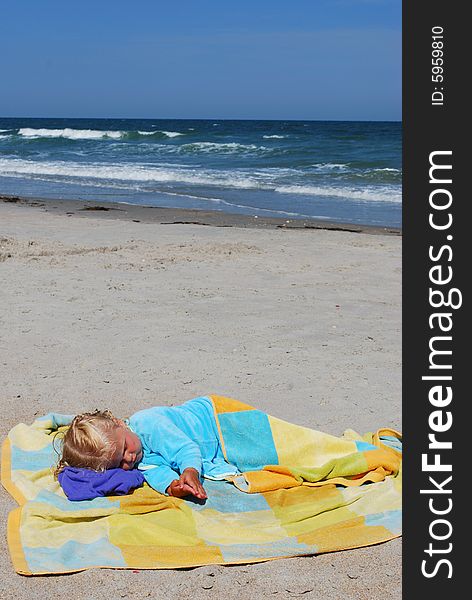 Little girl takes a break during a hot summer day. Little girl takes a break during a hot summer day