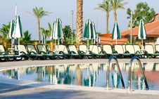 Chaise Longues Near Pool Stock Photo Chaise Longues Near Pool Stock Photo