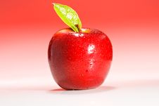 Shinny Red Apple With Green Leaf Stock Images