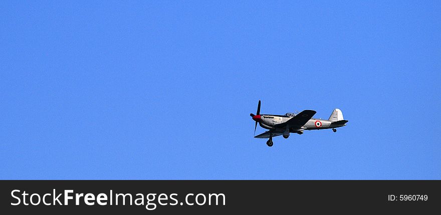 A plane doing acrobatic figures in the sky. A plane doing acrobatic figures in the sky.