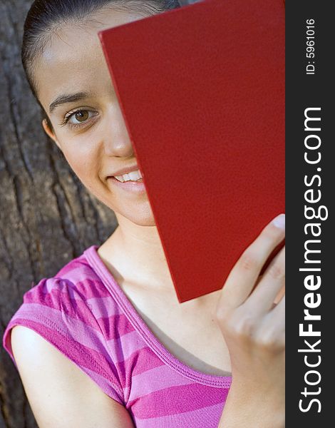 Young Woman Reading Outdoor