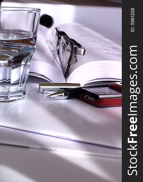 Glass of mineral water on the desk. Glass of mineral water on the desk