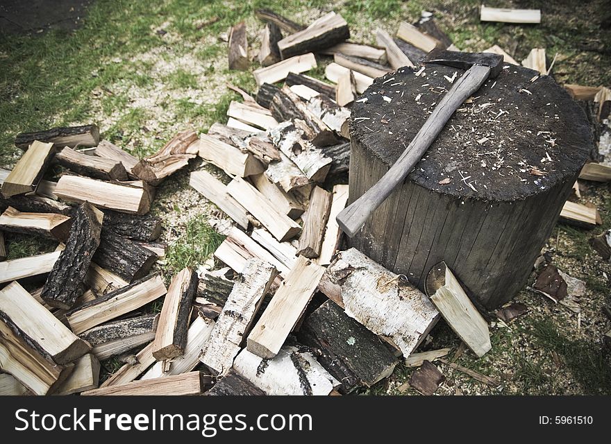 Cutting wood, axe, trunk, splinters. Cutting wood, axe, trunk, splinters.