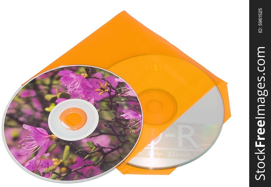 Compact disks and envelope on white background