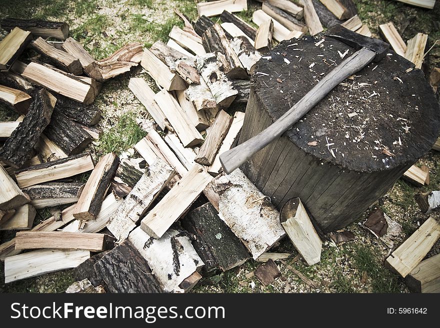 Cutting wood, axe, trunk, splinters. Cutting wood, axe, trunk, splinters.