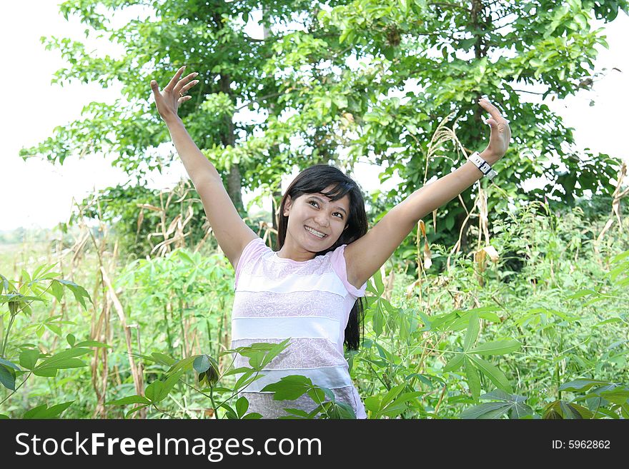 Girl enjoy and stretching in nature. Girl enjoy and stretching in nature