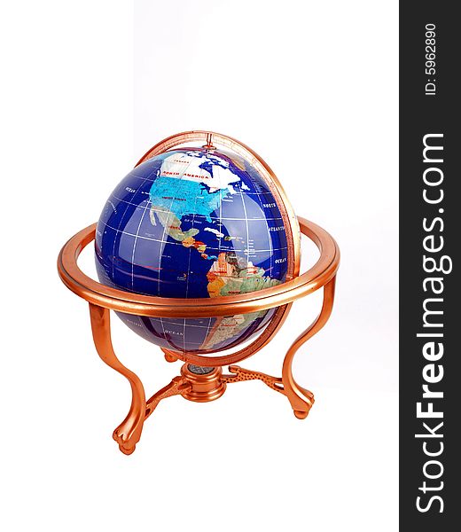 Isolated Brass Metal frame with big cat sculpture & shiny semi precious stone Globe showing North America & etc