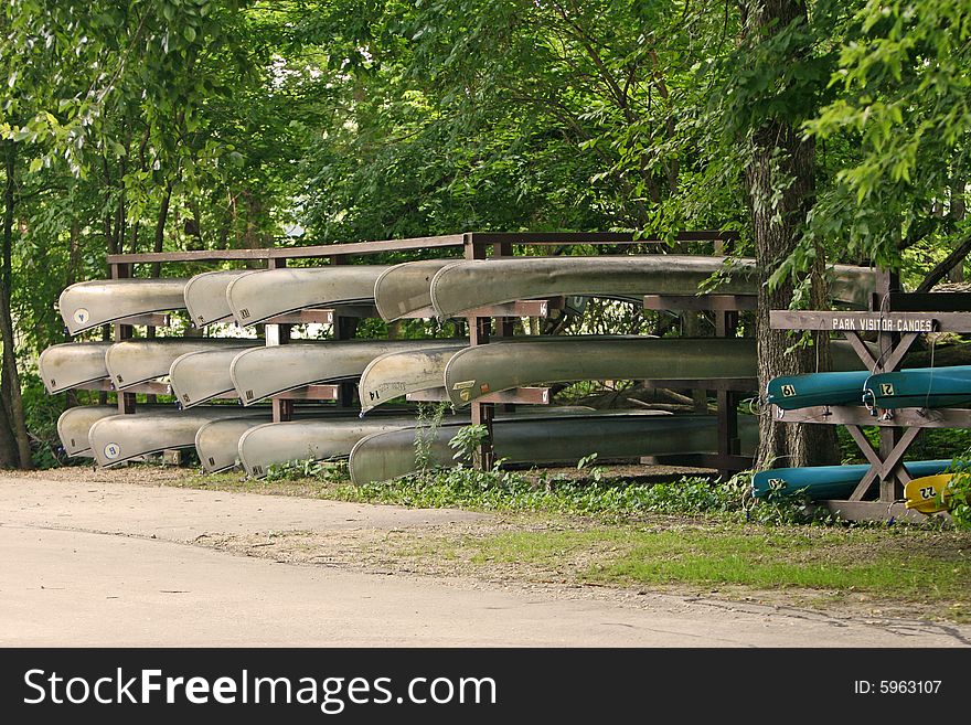 Bunch of canoes waiting to be rented. Bunch of canoes waiting to be rented