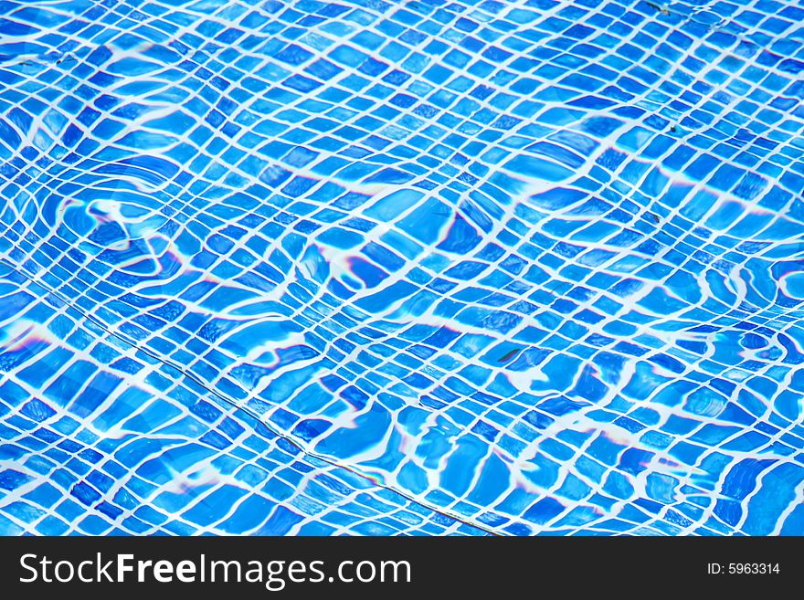 Clear and cool water in swimming pool. Clear and cool water in swimming pool