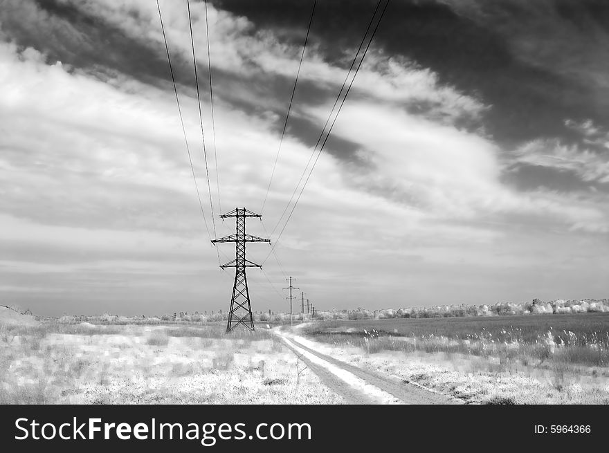 Landscape: road,  field, clouds and electric column. Monochrome. Landscape: road,  field, clouds and electric column. Monochrome