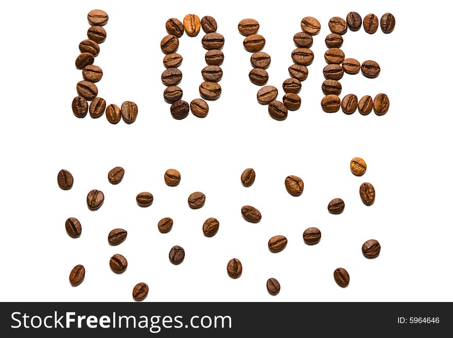 Photo of  word love made of coffee beans.  Isolated on white. Photo of  word love made of coffee beans.  Isolated on white.