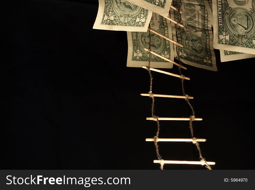 One dollar banknotes and rope-ladder hanging on dark background. One dollar banknotes and rope-ladder hanging on dark background