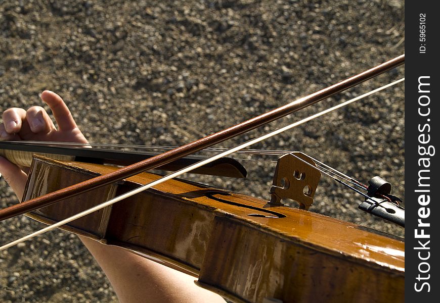 Macro of a viola, the strings, corpus and the bow