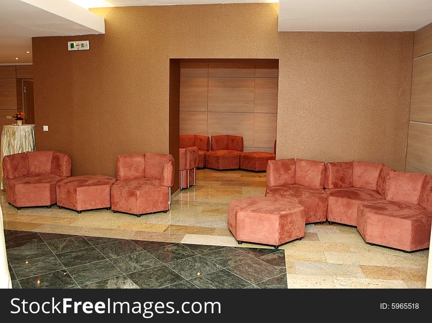 Many many armchairs in the room