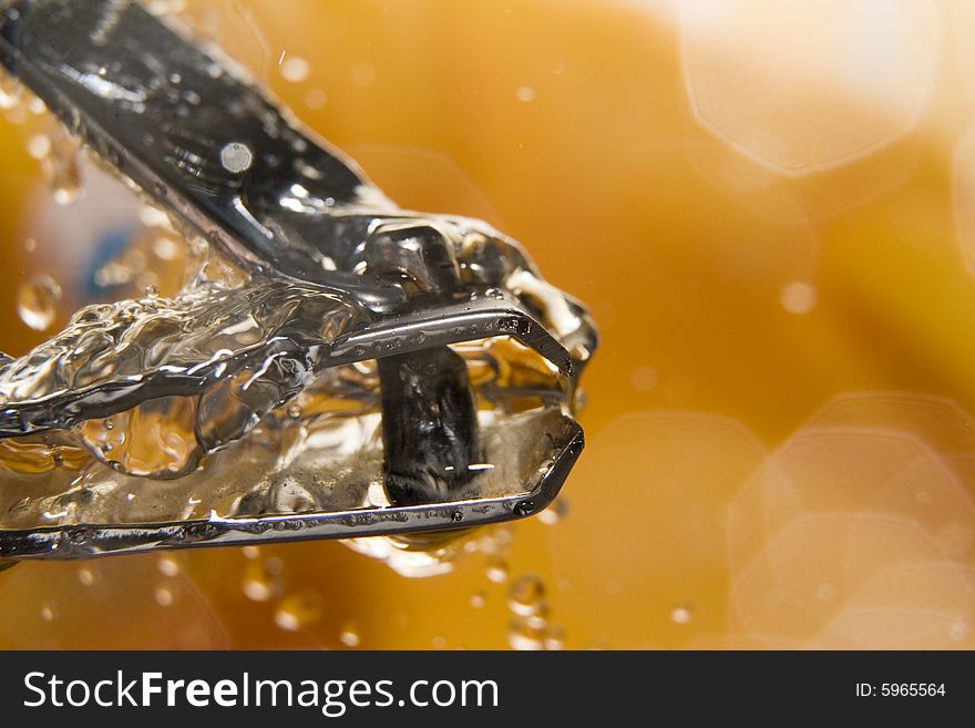 Metal and small appliance in the water drops