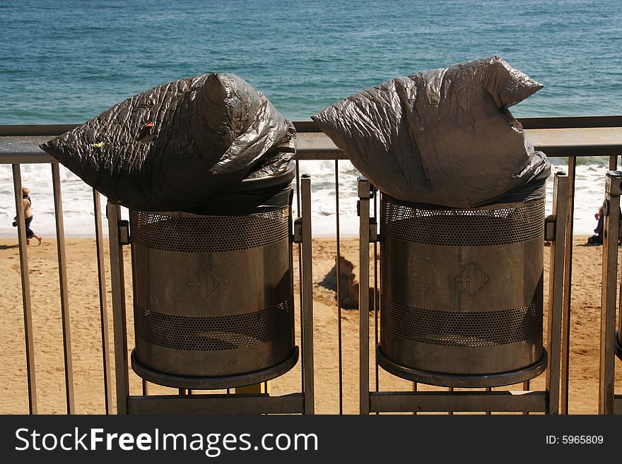 Two dust bins at barcelona beach. Two dust bins at barcelona beach