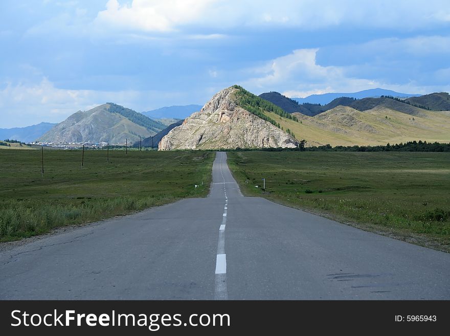 Landscape of road leaving in mountains. Landscape of road leaving in mountains