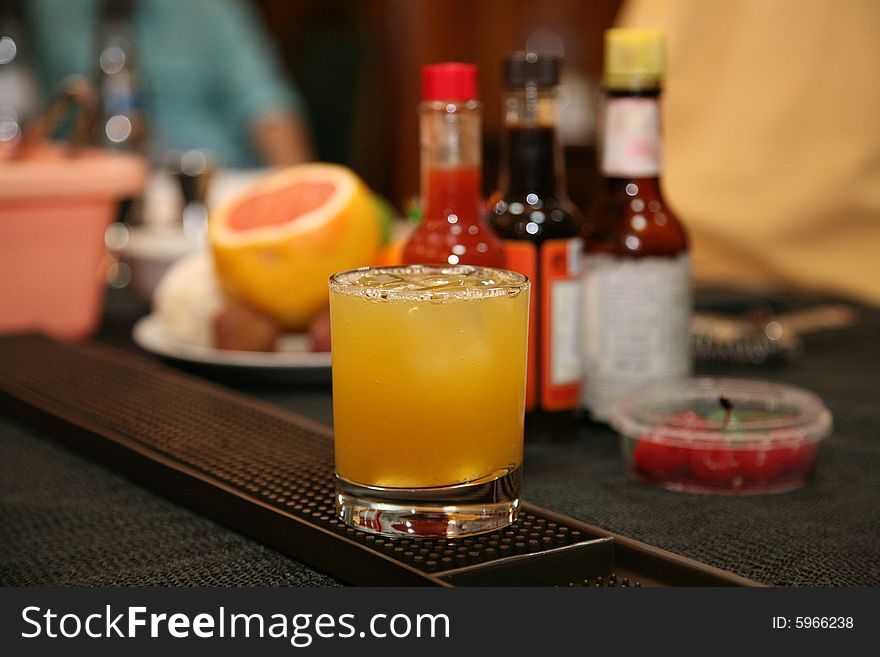 Cocktail in glass on the table in the bar