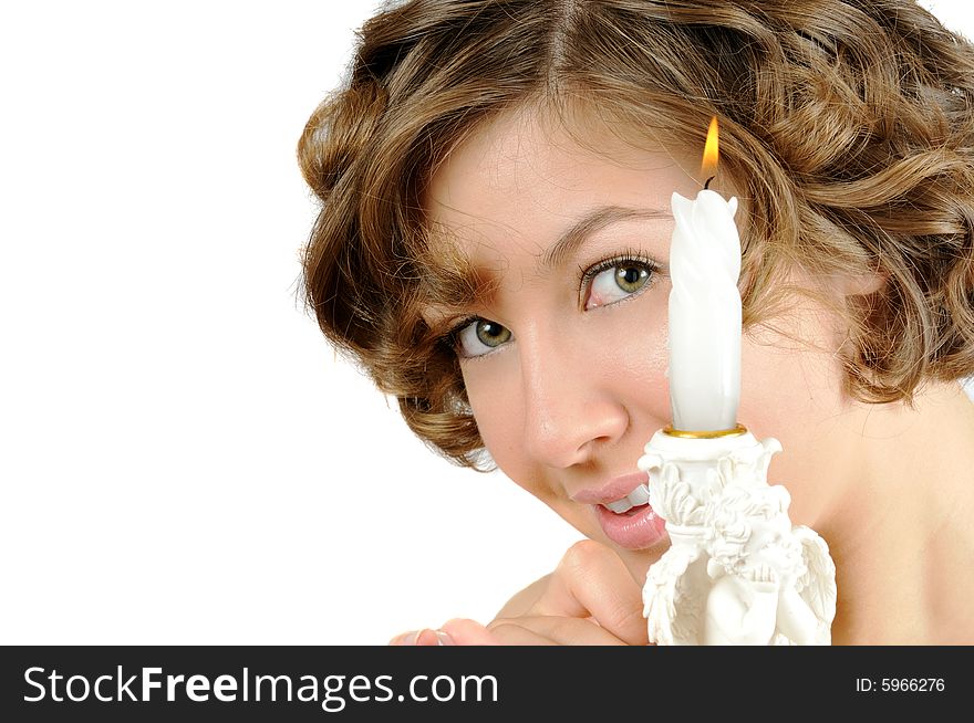 Pretty curly girl with candle