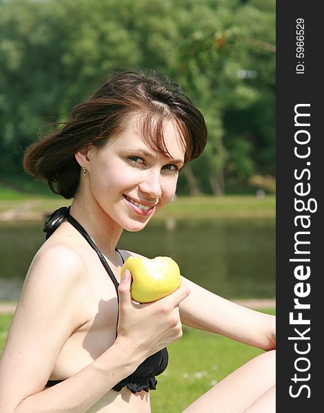 Girl  Eats An Apple