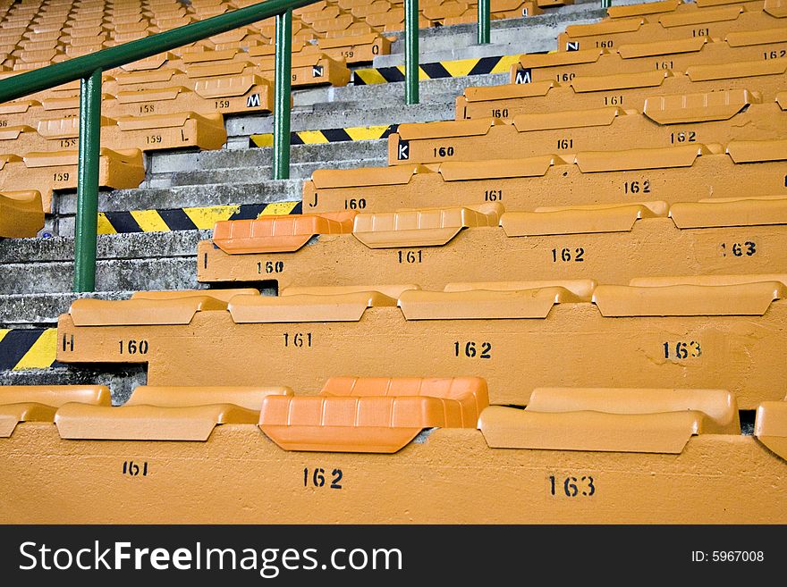 Rows of empty stadium seating - landscape exterior