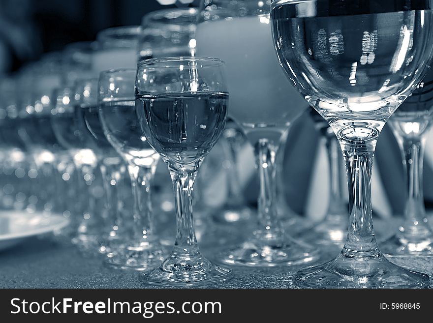 A rows of wineglasses in bar with wine. A rows of wineglasses in bar with wine
