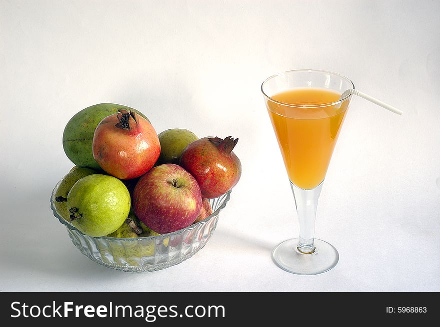 Still life with fruits & fruits juice on white background. Still life with fruits & fruits juice on white background.